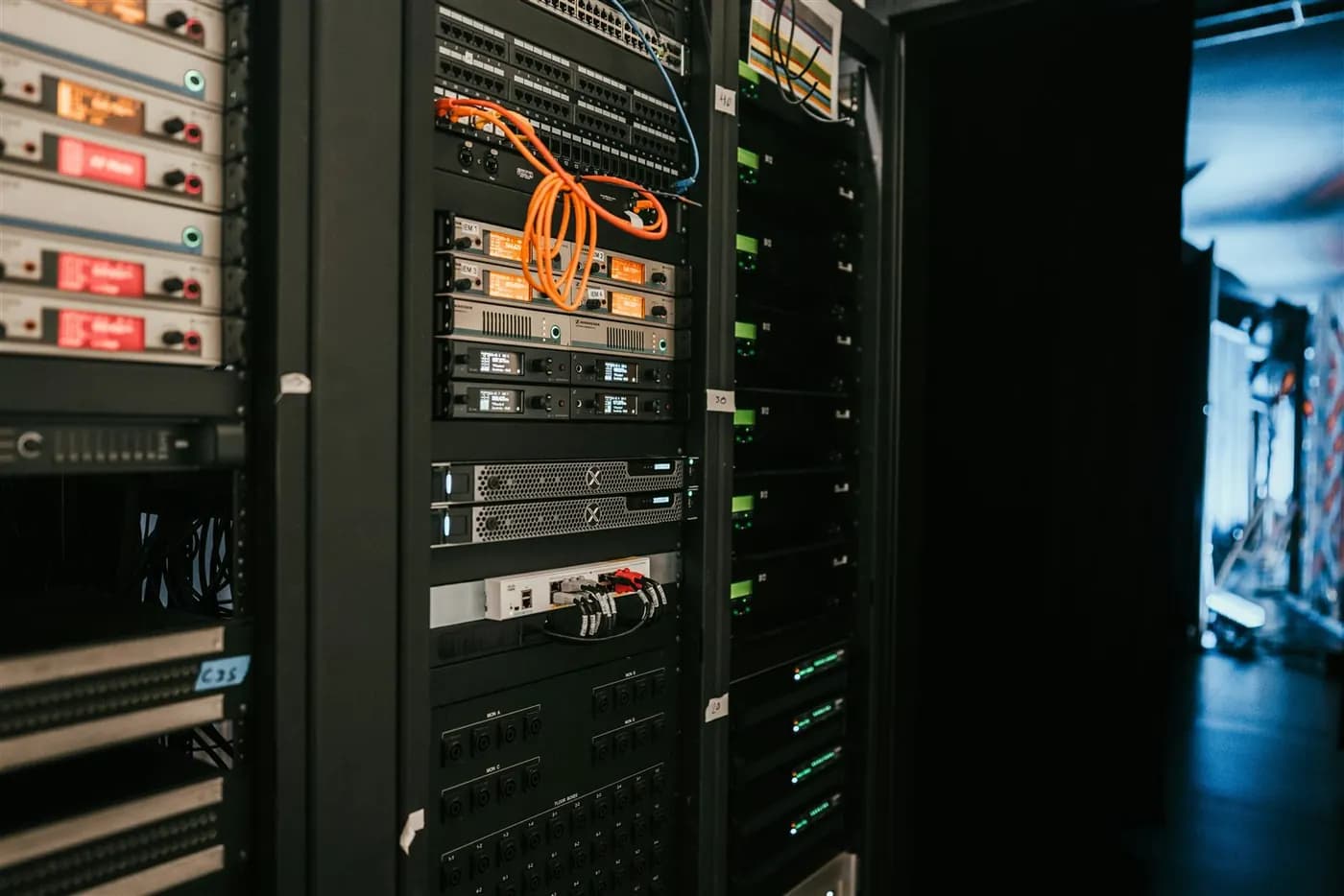 Server racks in a controlled data center environment
